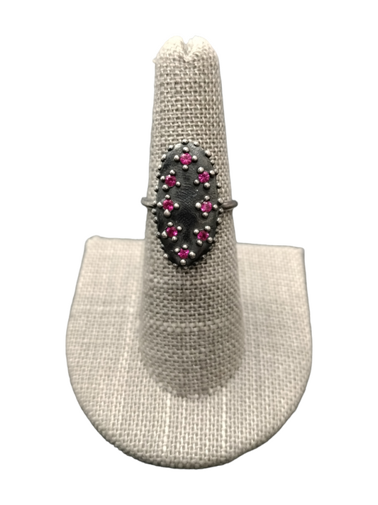 Ring by: Artist: Stacey Lane (8) lab created Rubies set in Oxidized Sterling silver in Size 6